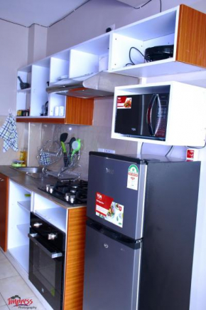 Executive 1 bedroom Airbnb with rooftop swimming pool